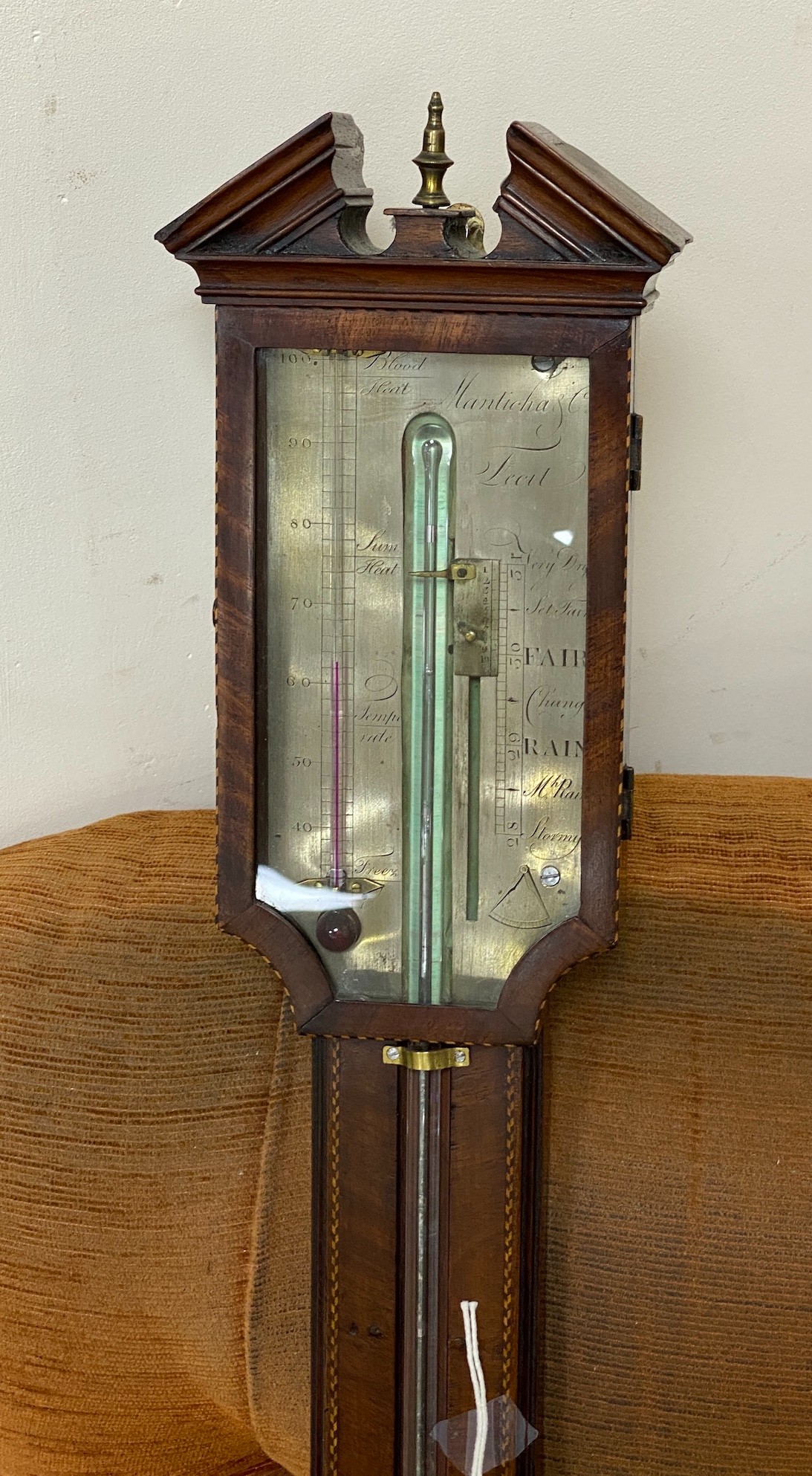 A George III mahogany stick barometer marked Manticha & Co., height 96cm